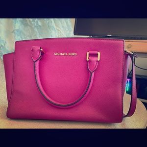 1 Michael Kors medium purse